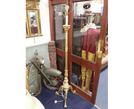 A GILT STANDARD LAMP 174cm high including fitting