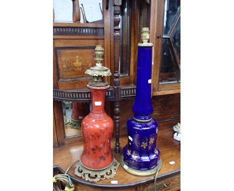 TWO VICTORIAN COLOURED GLASS TABLE LAMP BASES the tallest 50cm high, converted to electricity 