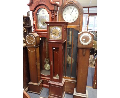 A 1920S OAK-CASED LONGCASE CLOCK 185cm high, two 1930s grandmother clocks, and two modern longcase clocks (all in need of att