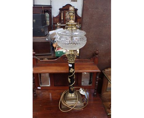 A TABLE LAMP, CONVERTED FROM A VICTORIAN OIL LAMP with cut-glass font 62cm high 