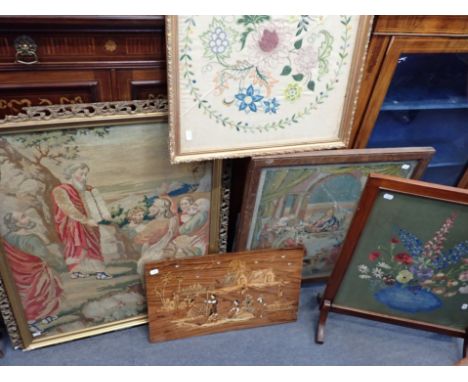 A VICTORIAN WOOL WORK PICTURE depicting Moses with the Tablets , another similar, as a firescreen, a Marquetry panel, and oth