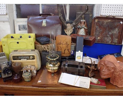 A BRASS OIL LAMP, MOUNTED ANTLERS, SODA SYPHONS and a collection of sundries
