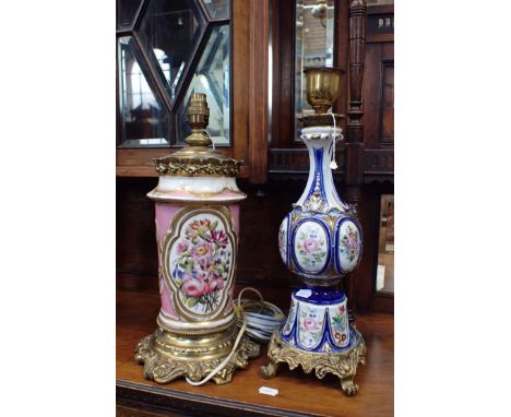 TWO VICTORIAN CERAMIC AND GILT TABLE LAMP BASES the tallest 42cm high , converted to electricity