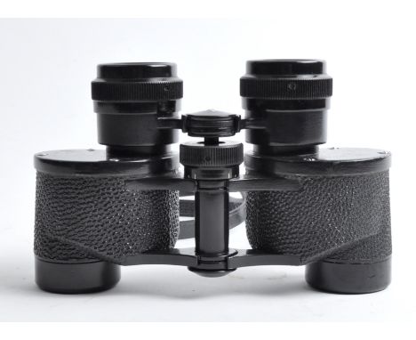 A pair of 6WU2 6 x 24 compact vintage soviet binoculars.&nbsp; Made in the USSR, serial number: 7414094.&nbsp; Optics are cle