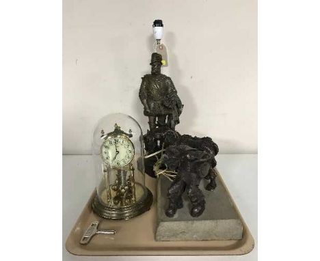 A tray of anniversary clock, spelter table lamp, miner and horse sculpture on stone base  