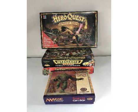 Four boxed games - War Hammer 4000, War Hammer Hero Quest, Magic The Gathering Starter pack etc 