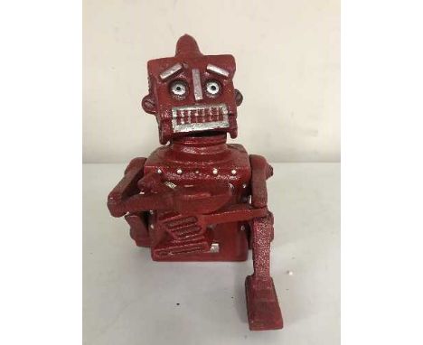 A cast metal robot money bank