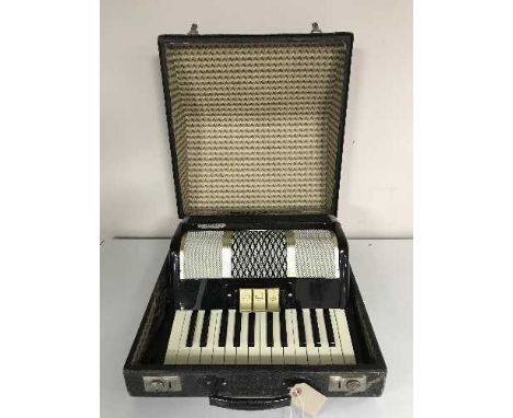 A cased Bell accordion