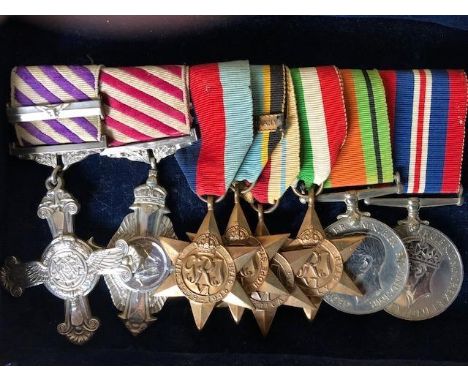 An important aviation group of medals and service log book and associated paperwork awarded to Albert Hart Crowe, comprising 