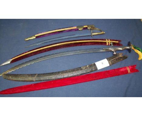 19th C leather bound Indian Talwar scabbard, a modern Indian style sword scabbard, a 20th C Indian Talwar type sword and a mo