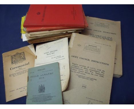 Box containing a large selection of military ephemera, booklets and pamphlets including Field Almanac 1918, various regulatio