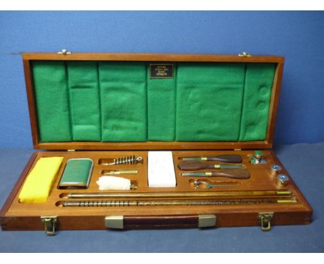 As new large rectangular cased Deluxe 12 bore cleaning kit with various tools and accessories, including snap caps, oil bottl