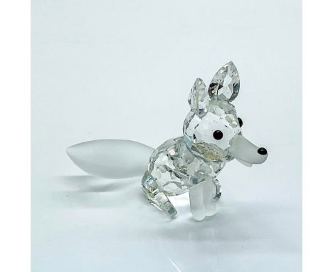 Multifaceted clear crystal fox with black nose and eyes, frosted tail, nose and front legs. Swarovski etched backstamp. Certi