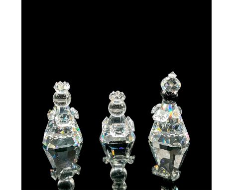 Three small clear faceted crystal figures of the Three Wise Men from the Nativity story. Retired. Swarovski mark. Item number