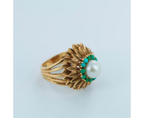 Beautiful cocktail ring with an imitation pearl in the center surrounded by small round turquoise cabochons. Stamped Kimberly