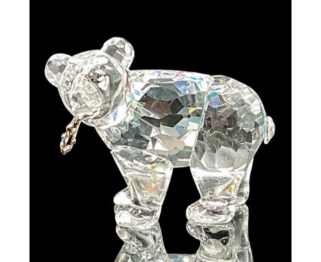 Made in clear faceted crystal, this Grizzly holds a silver fish in its mouth. Swarovski etched backstamp. This item has its o