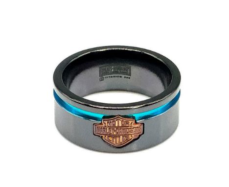 Black titanium band with a copper tone Harley Davidson logo and thin rainbow channel stripe around the top. Titanium and 925 