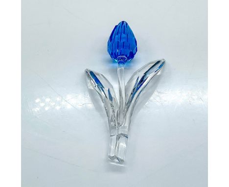 Multifaceted clear crystal with blue flower. Was a gift for those members renewing their memberships in 2002. Swarovski etche