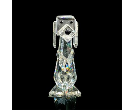 Clear faceted crystal figure of a dog with black eyes and nose. Item number 7635NR070. Swarovski etched mark. This item has i