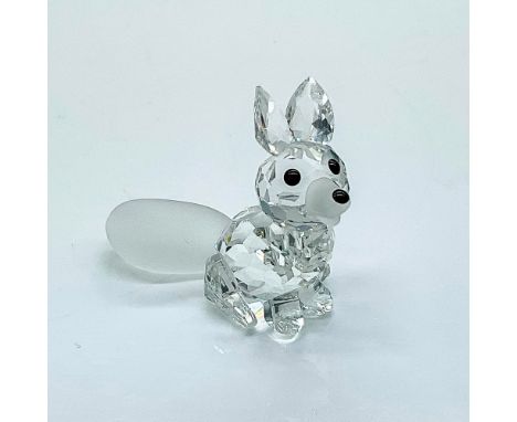 Multifaceted clear crystal fox with black nose and eyes, frosted tail, nose and front legs. Swarovski etched backstamp. Certi