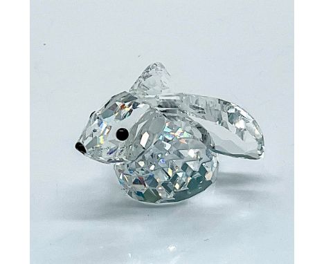 Multifaceted clear crystal with black eyes and nose. Part of the In a Summer Meadow collection. Swarovski etched backstamp. T