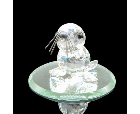 Clear faceted figural with black crystal eyes and nose. Black metal whiskers. Swarovski backstamp. This item has a mirrored b