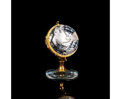 Lead crystal made with frosted crystals accents and is finished with gold-tone metal. Interior is decorated with a small cloc