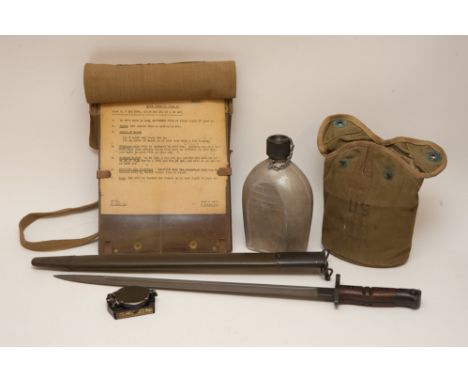 A collection of  various US Military items including a bayonet,compass,and water bottle together with a map