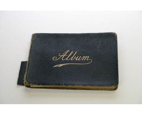 An interesting WW1 sketch album containing watercolours, poems and a pen and ink cat sketch signed in the manner of Louis Wai