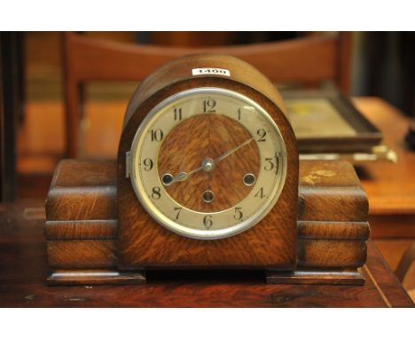 An oak mantel clock of Art Deco design