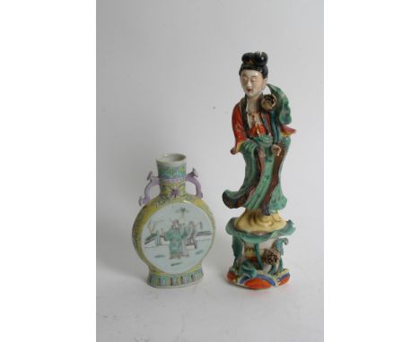 A small Chinese famille jaune moon flask together with a Chinese polychrome figure