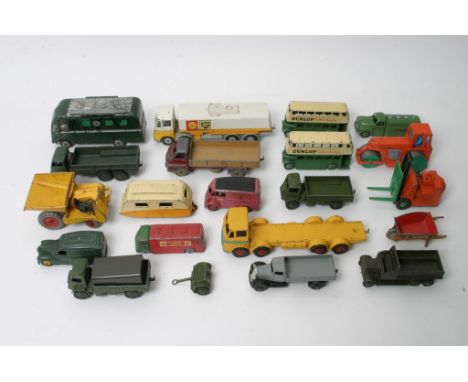 A collection of playworn Dinky diecast cars including a dark green Castrol, Diesel roller, Caravan, Dunlop 290 bus x 2, Royal