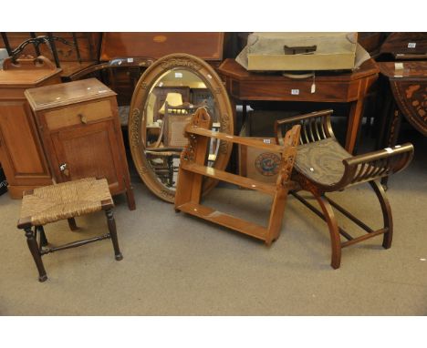 An oak bedside cabinet, small open shelf, Edwardian stool, rush seat stool and an oval mirror