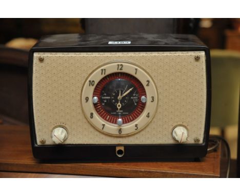 A Bakelite alarm clock radio