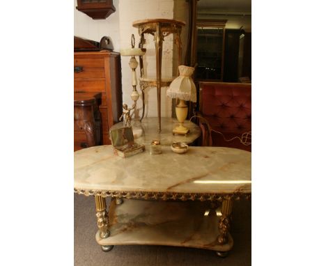 A collection of three onyx topped brass tables together with a box of onyx items including table lamp and ashtray