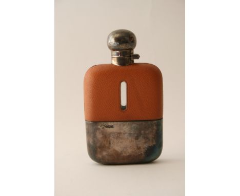 A silver and leather cased hip flask