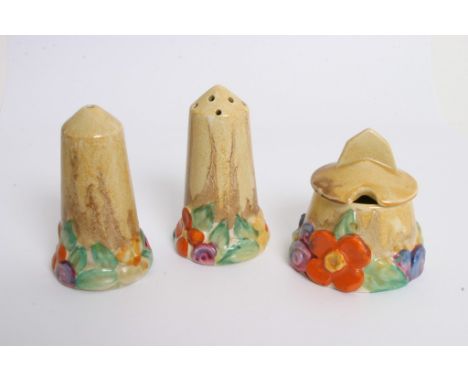 A Clarice Cliff condiment set in 'My Garden' pattern consisting of salt, pepper and mustard pot.