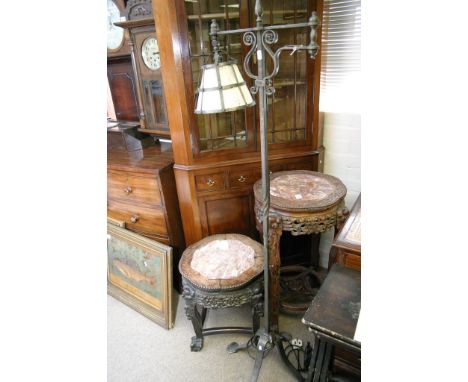 A wrought iron Arts and Crafts style standard lamp 