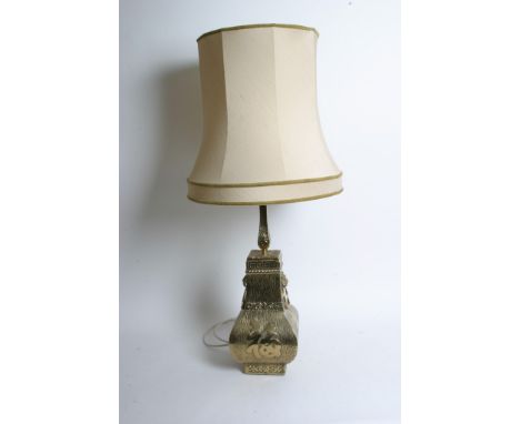 A Chinese brass table lamp of square bulbous form