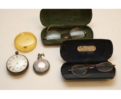 An Atkinson silver cased pocket watch, small keg or flask and two pairs of spectacles