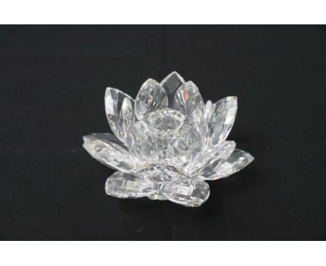 A Swarovski crystal small candlestick shaped as a flower, boxed