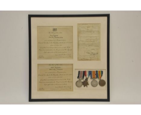A framed set of four First World War medals including bravery in the field awarded to PTE .J. Meadows Essex Regiment First Bn