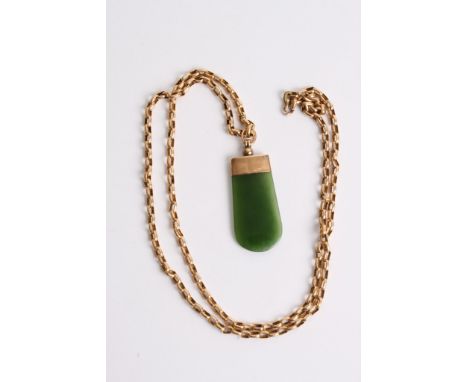 A 9ct gold mounted nephrite jade pendant on gold belcher chain