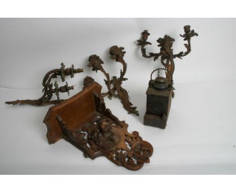 An old Southend railway lamp, a wall bracket carved with a wild boar and three Rococo style wall lights