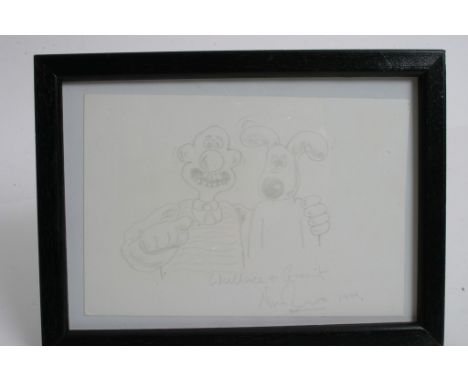 A small framed pencil sketch of Wallace and Gromit, signed by Nick Park