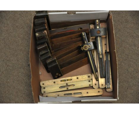 A quantity of ventage brass mounted tools including scribes, spirit levels, set squares (20)