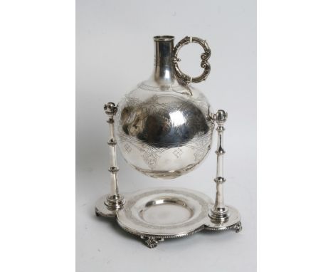 A 19th century silver plated tilt action flask on stand