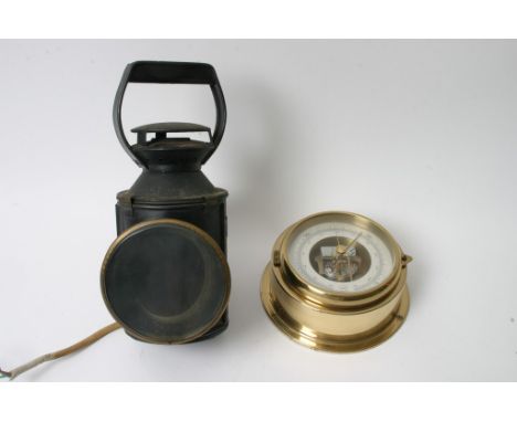 A German brass cased barometer together with a British Rail BR lamp