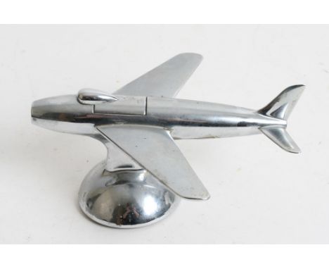 A Dunhill chrome table lighter in the form of an airplane