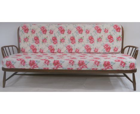 An Ercol three seater sofa re-upholstered in a Cath Kidston floral fabric, 83cm high x 197cm wide x 95cm deep Condition Repor